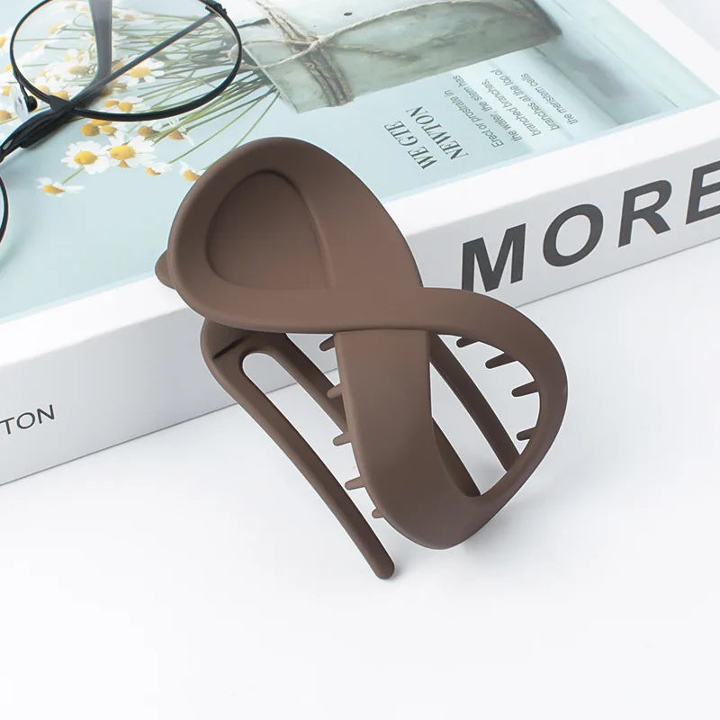 Pince à Cheveux Infinity – Accessoire Multi-Styles pour Chignons et Coiffures