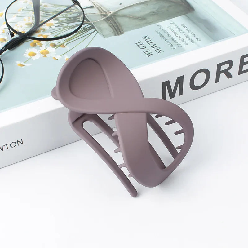 Pince à Cheveux Infinity – Accessoire Multi-Styles pour Chignons et Coiffures