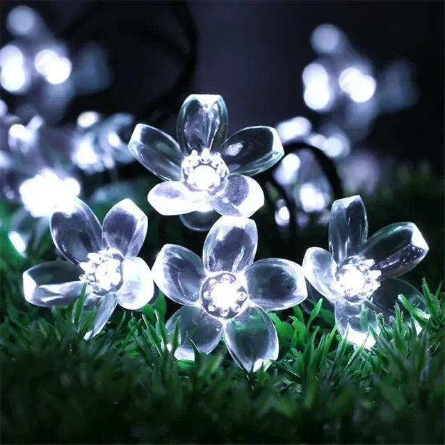 Guirlande solaire avec boules à motifs de 5 à 12M