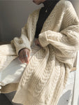 Cardigan long tricoté à grosses mailles